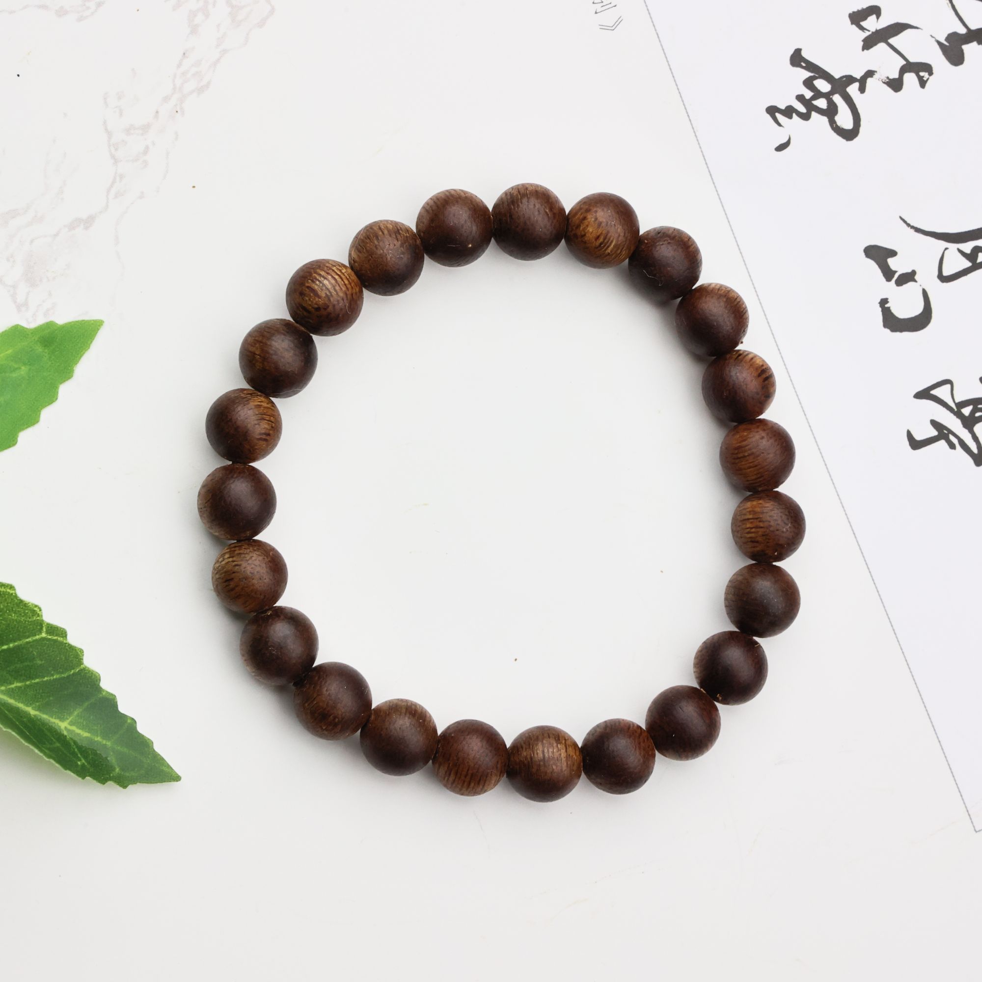 沉香8mm奇楠沉香圆珠单圈手串 素 S250358