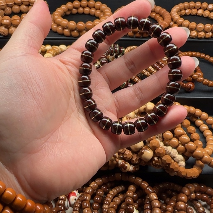 姐****o紫金鼠一线天手串