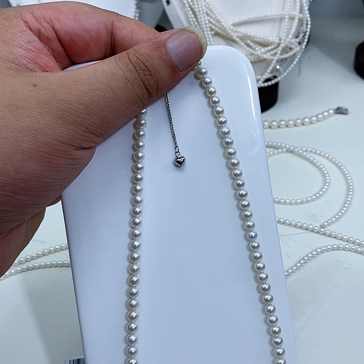 奶****颈饰银S925镶嵌淡水珍珠