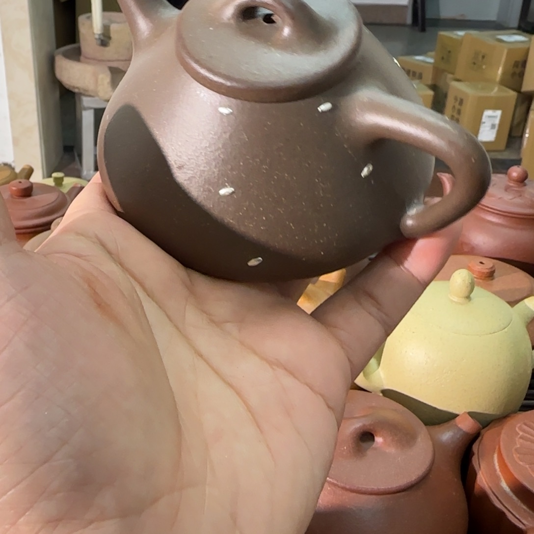 紫砂茶壶与***事天青石瓢