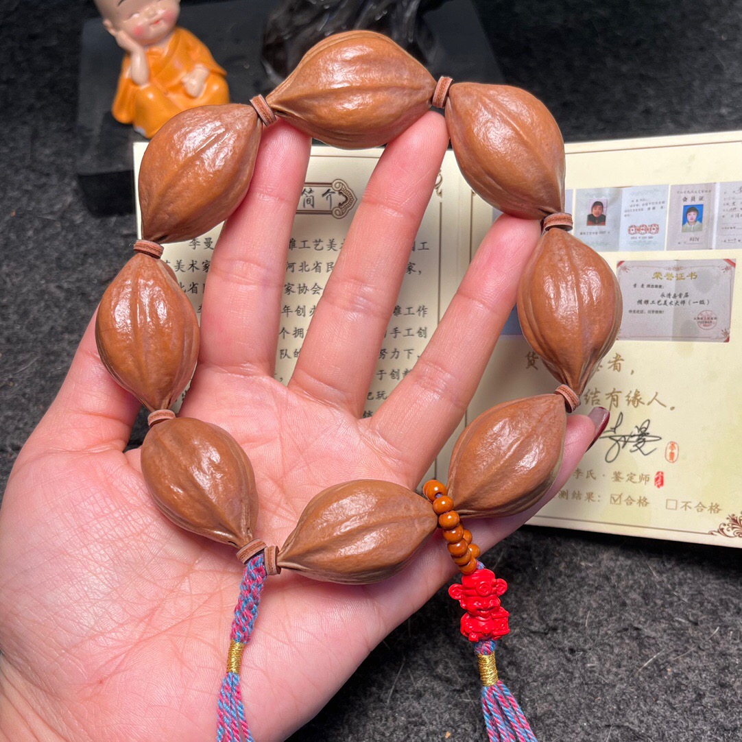 来财红砂水晶核大鲨鱼背橄榄核素核原皮素串文玩手串