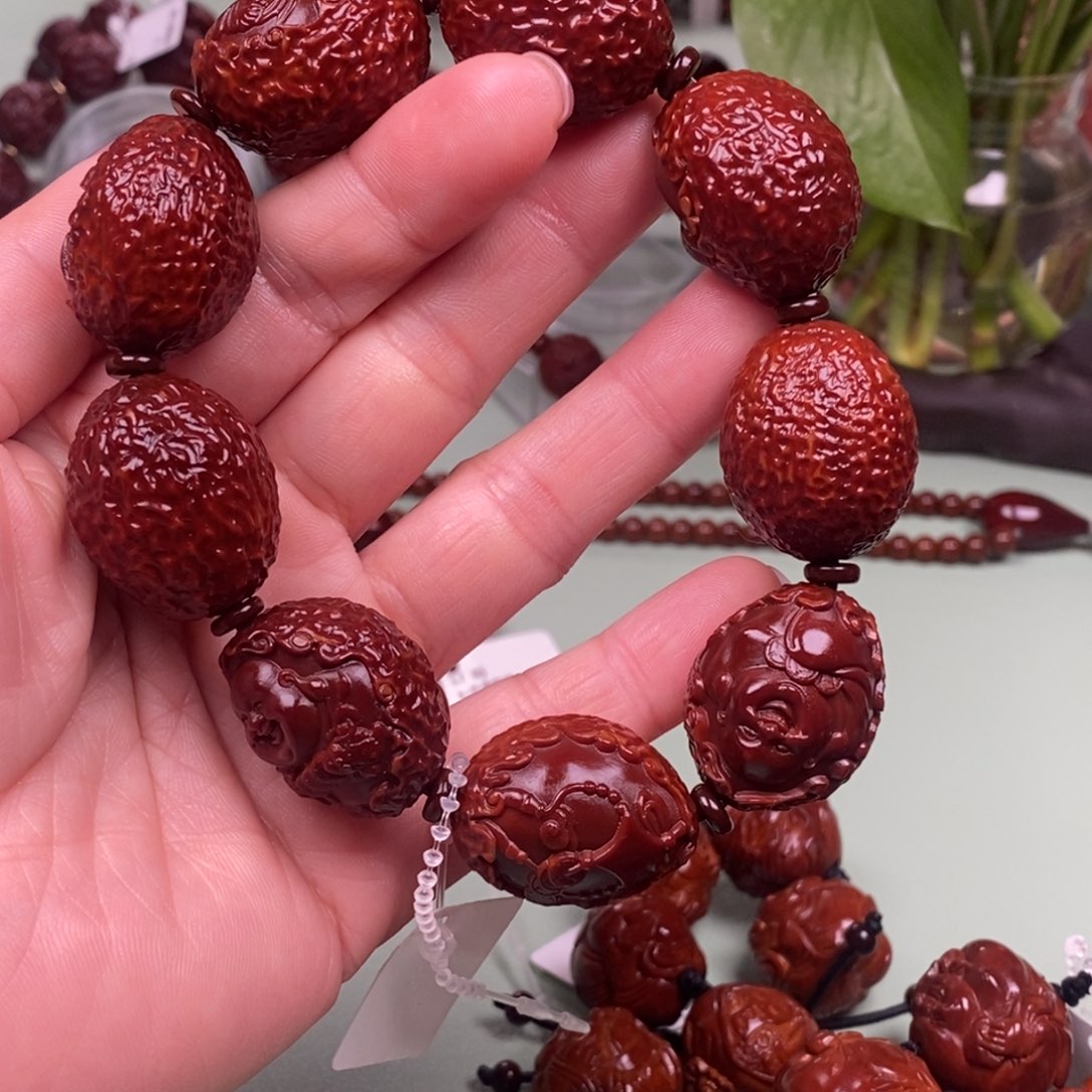 睿***宝紫光檀橄榄核回血直播间
