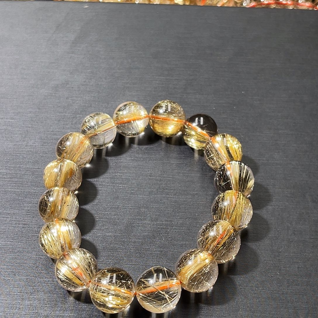 柚***萃未镶嵌发晶手串钛晶