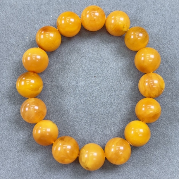 蜜糖色白花14mm瑕疵蜜蜡圆珠手串（549号）