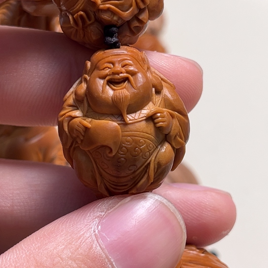 橄榄核吊坠張***生整身财神