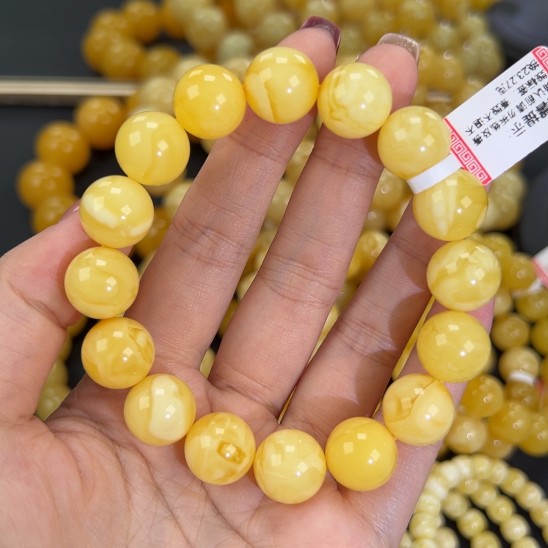 琥珀未镶嵌手链23.2黄白妖花
