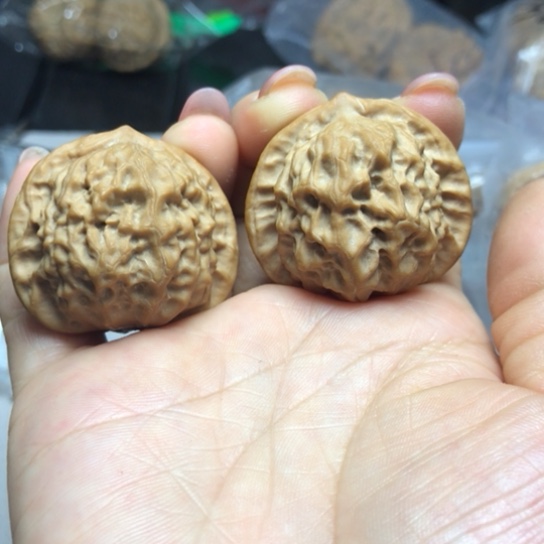 文玩核桃吊坠瓷娃娃