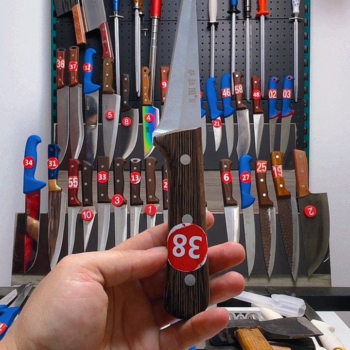 以**马鸡翅木柄307小剔骨