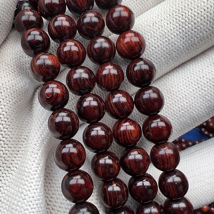 花梨木类红降08圆珠黑金满油多圈（瑕疵）