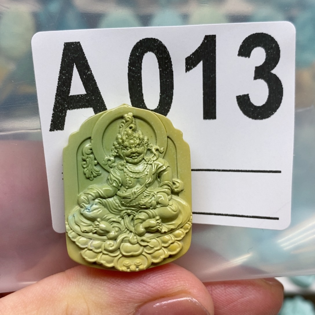 绿松石绿松石黄财神未镶嵌