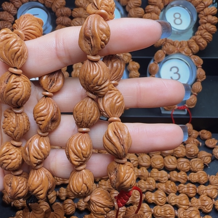 周***王手串桃核生命手串