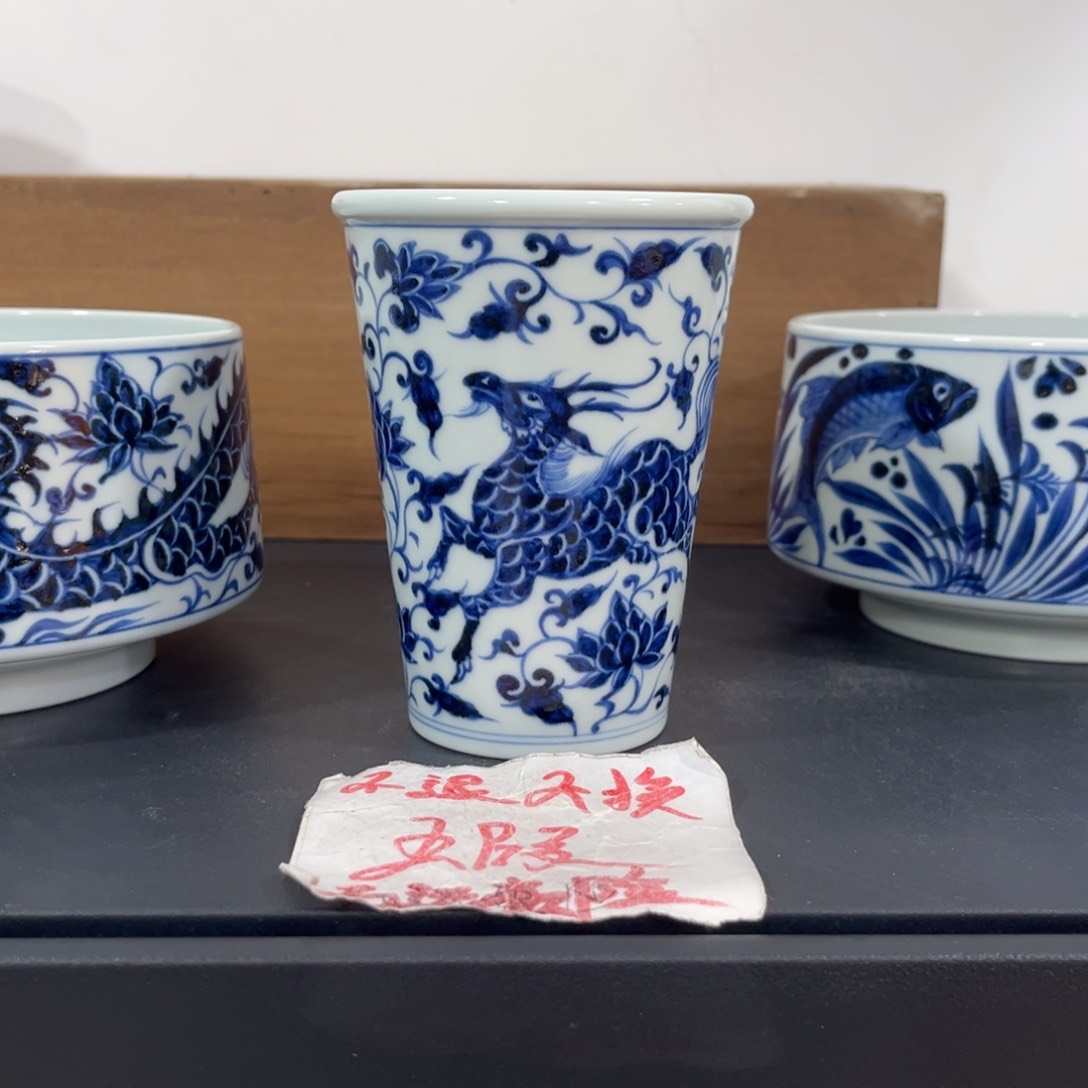 手绘仿元缠枝麒麟大可乐杯