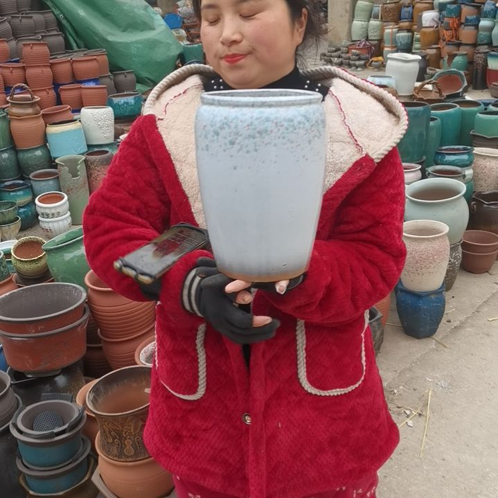 红陶口17高26瑕疵一个