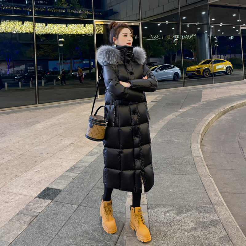 黑色羽绒服女长款过膝2025冬季新韩版款貉子毛领加厚保暖防寒外套
