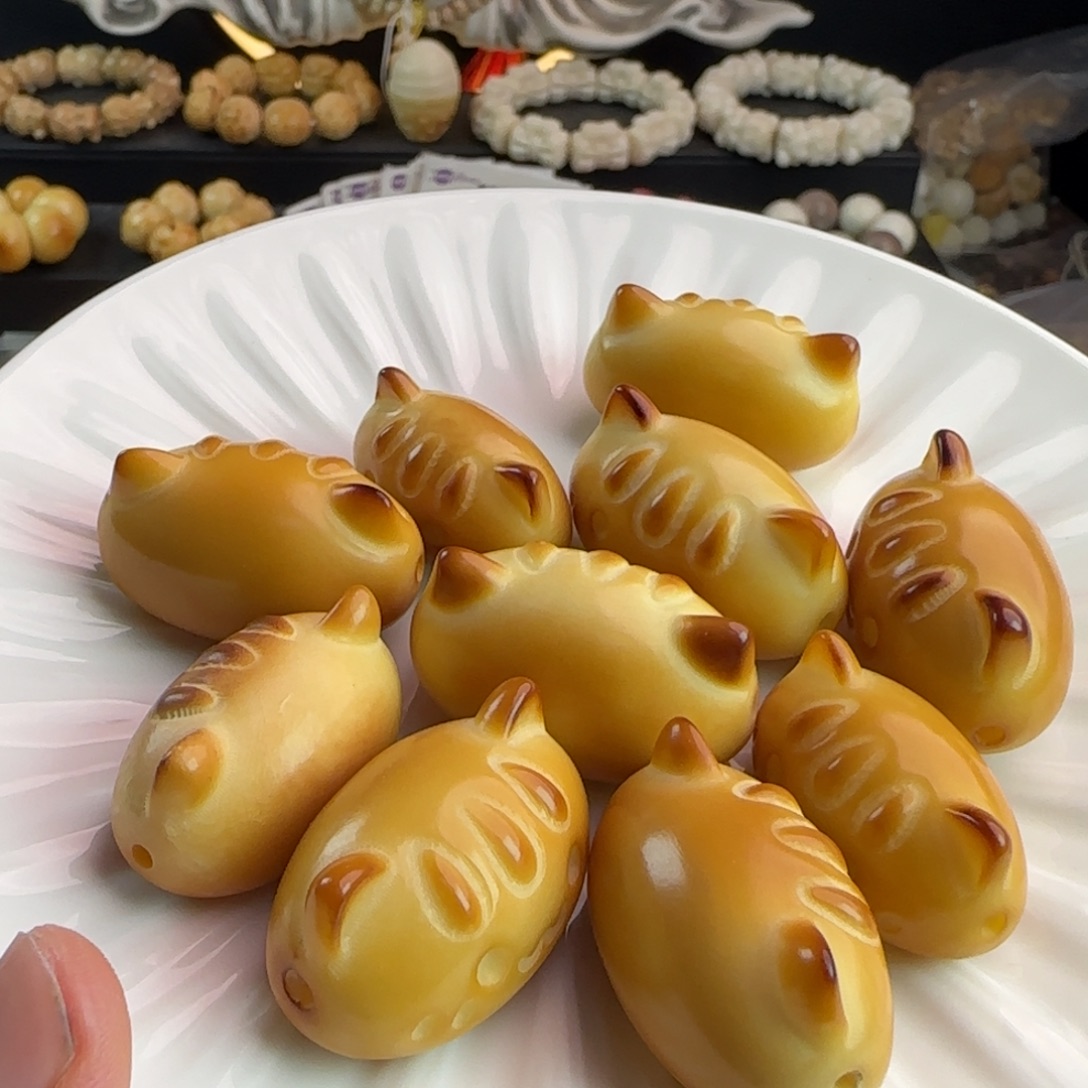 手串菩提根/象牙果微瑕疵炭烤长条猫4颗（大小随机）