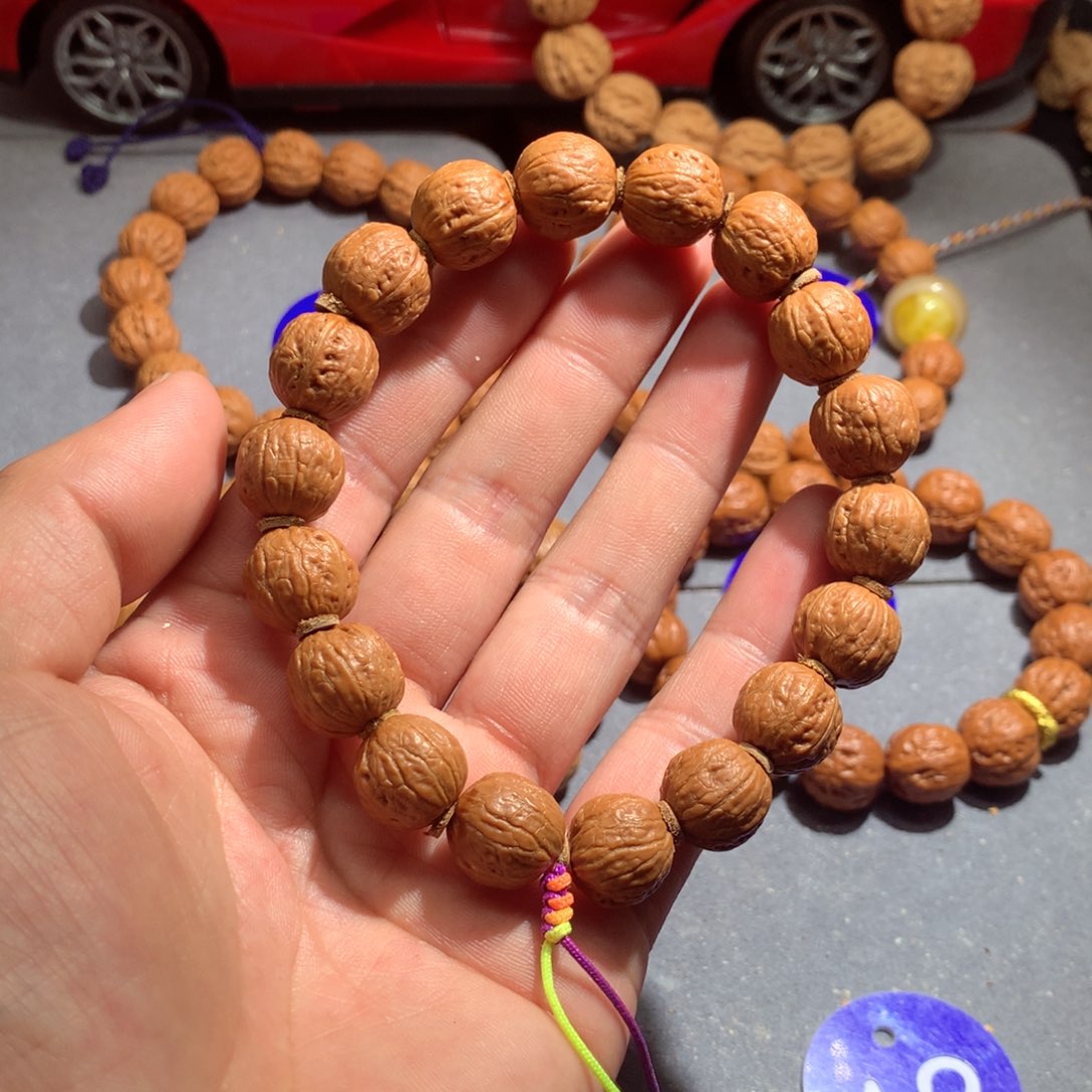 文玩核桃吊坠小金豆