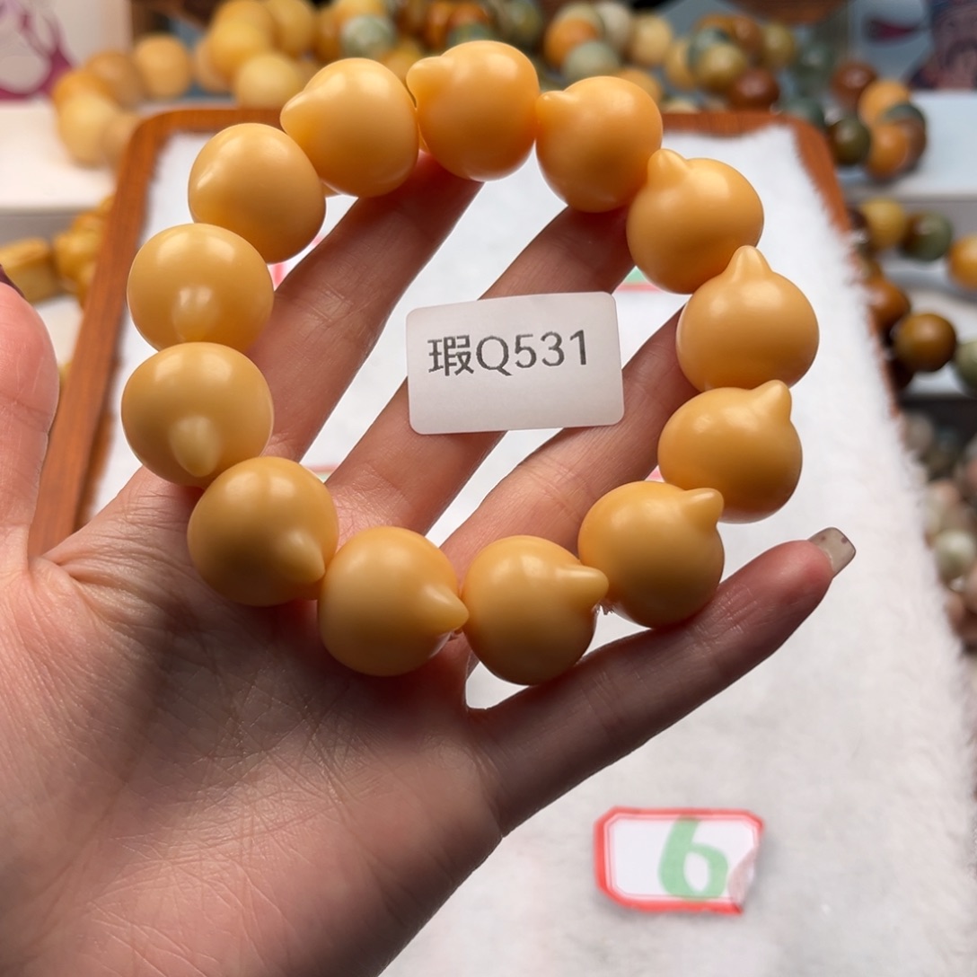 菩提根/象牙果手串七*夏19mm瑕猫头一串q531