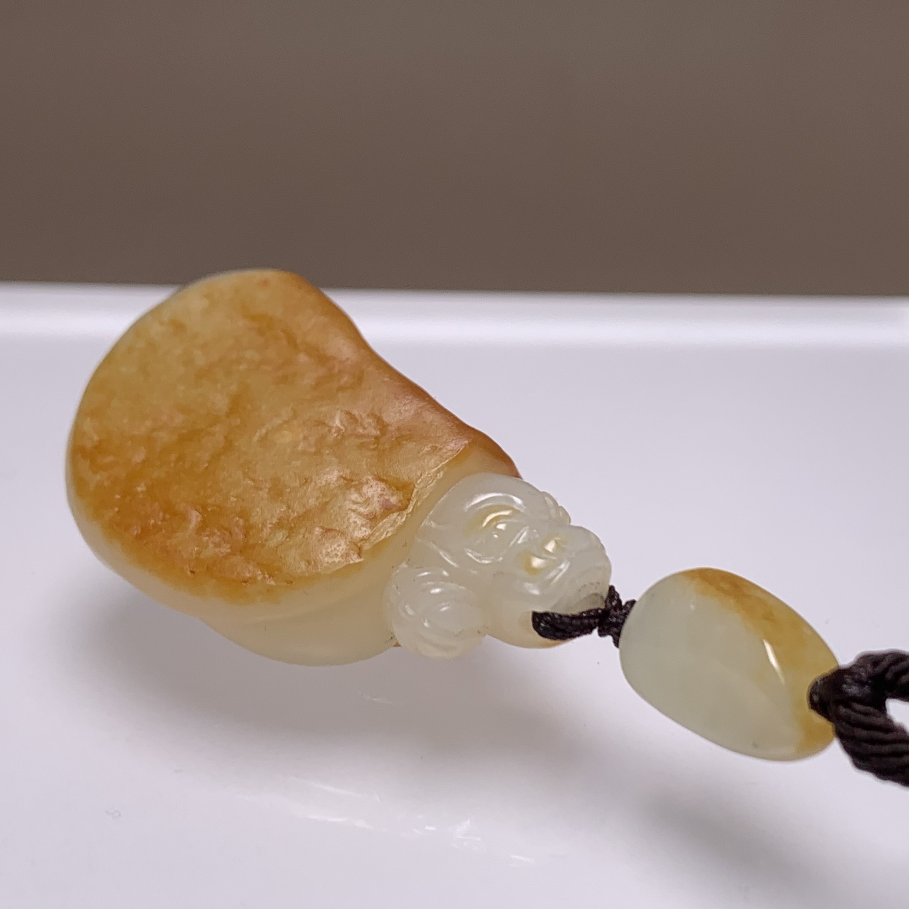 D952海川拍卖和田玉吊坠