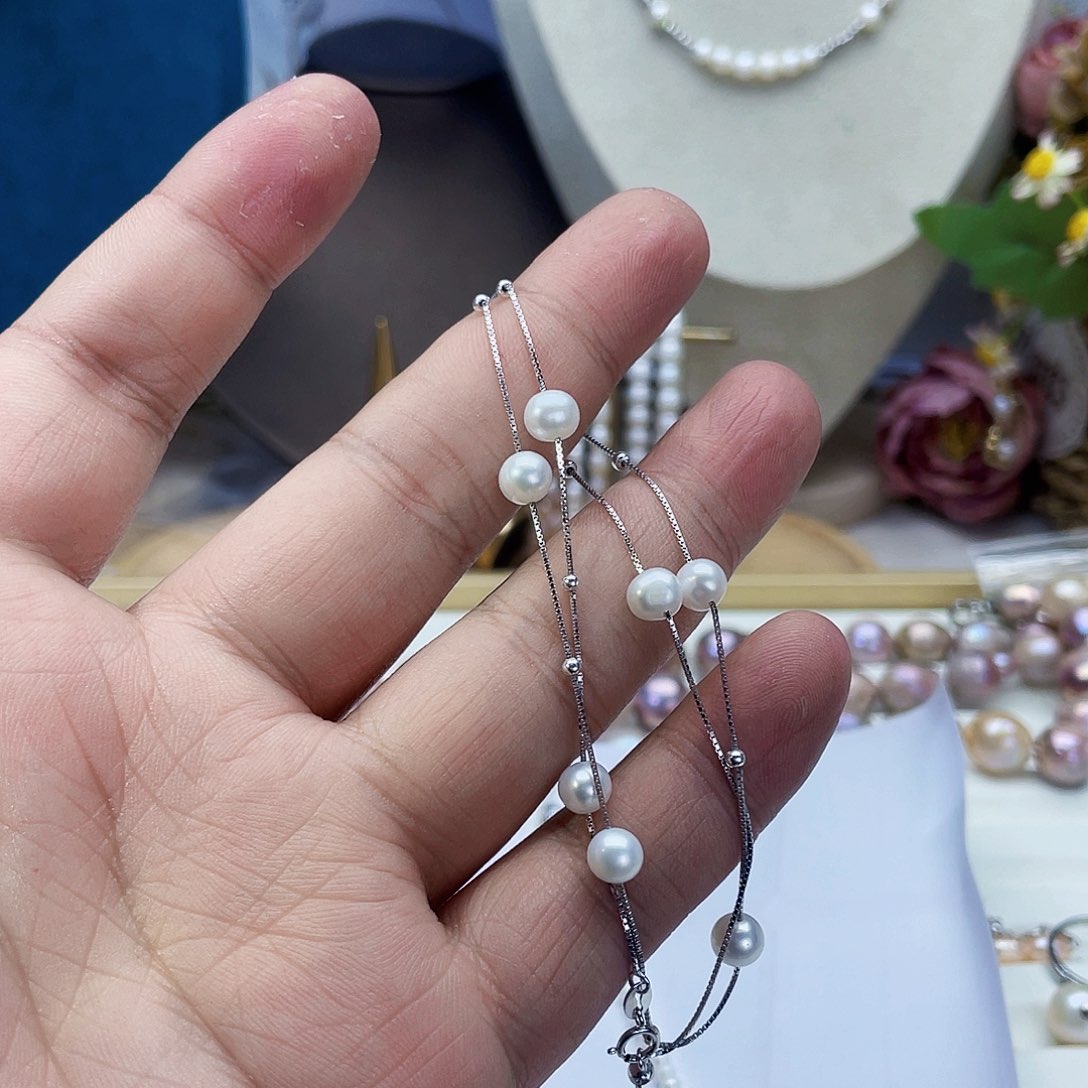 淡水珍珠颈饰银S925镶嵌雨*铃