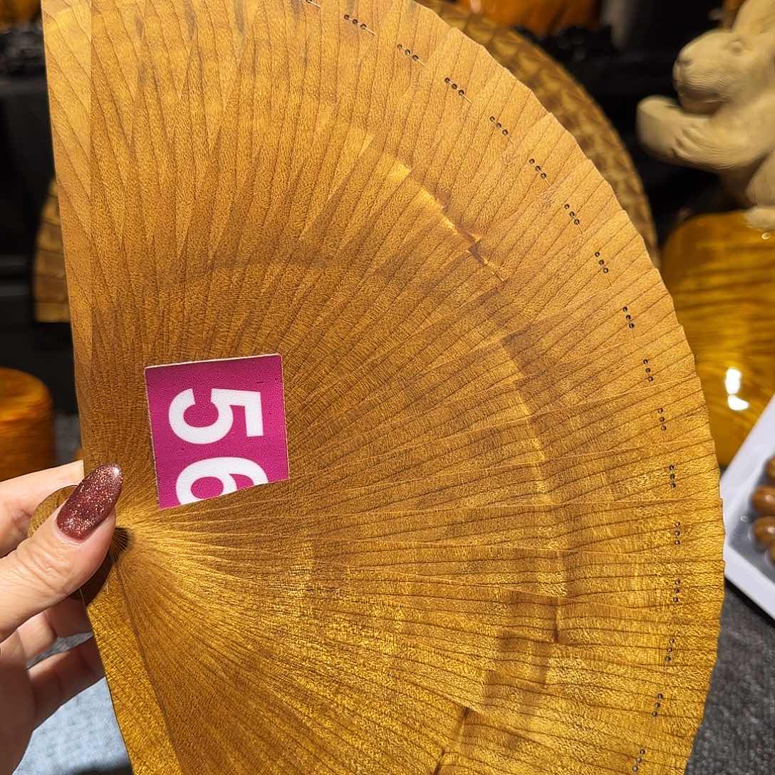 金丝楠道****）金丝楠木手把件