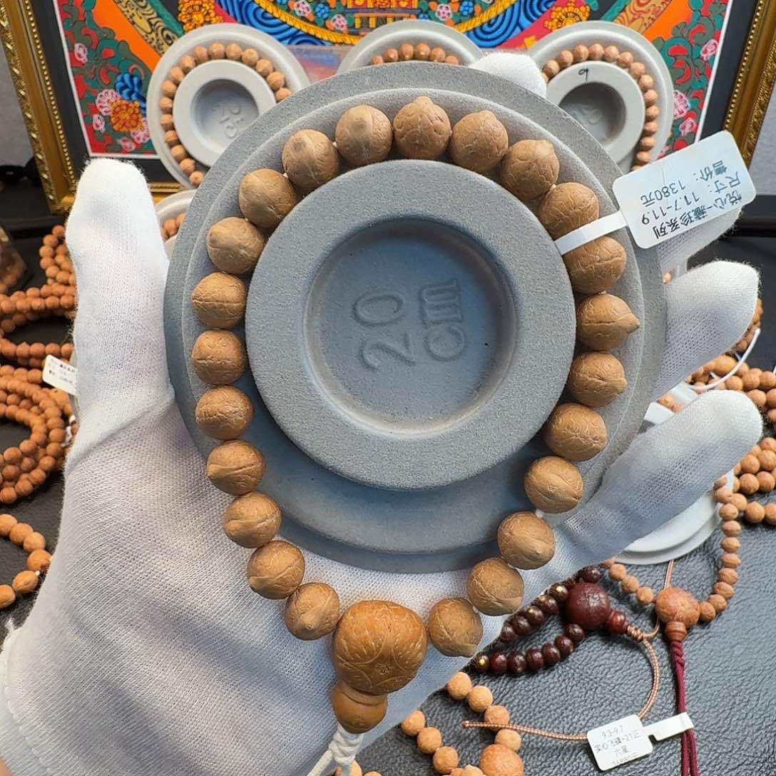 峰***华凤眼菩提吊坠11.7素23颗籽手持