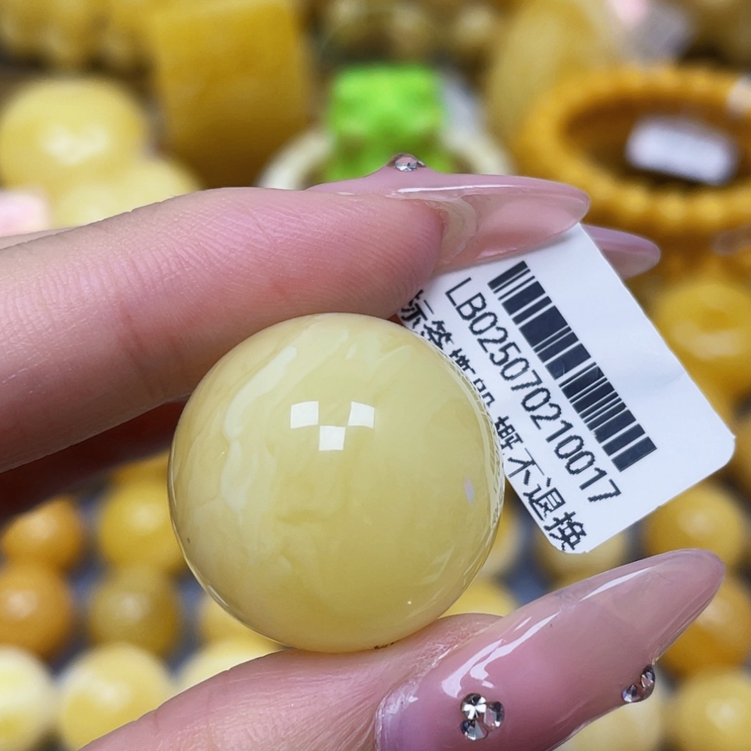 蜜蜡未镶嵌裸石22.5mm瑕