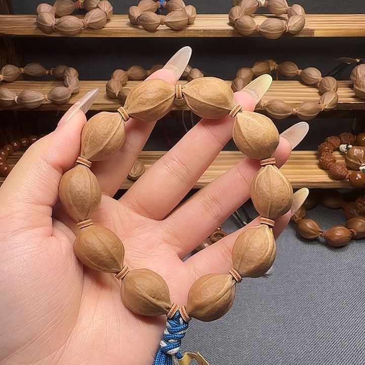 你***吃手串橄榄核1824梅林铁核三花鲨鱼背