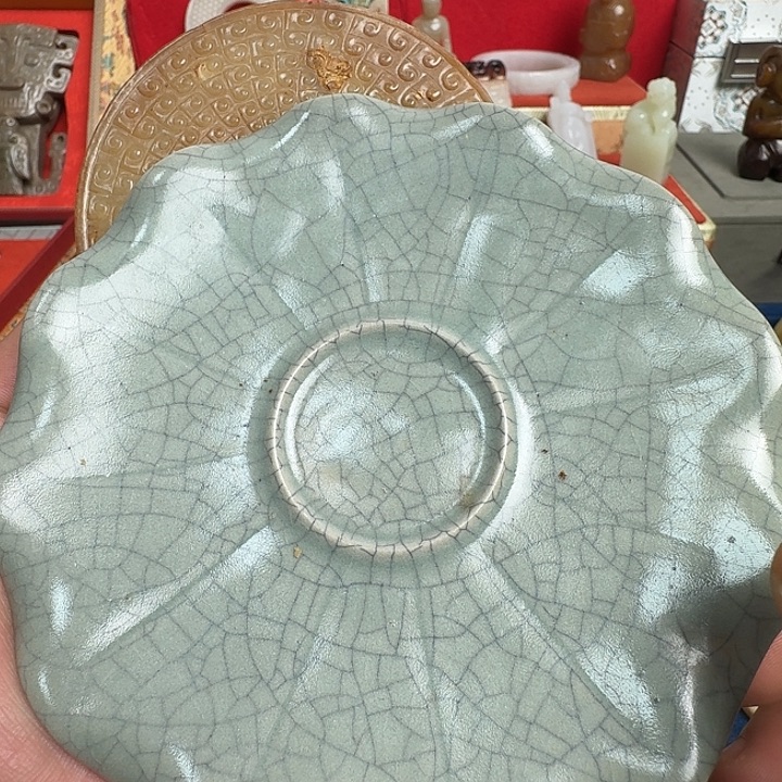 玉***8瓷片古董的人在那里玩啊哈哈啊