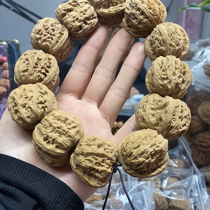 文玩核桃把件36白狮子手持