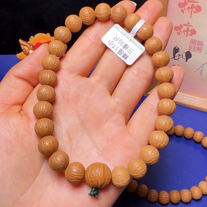 圆***周吊坠猴头核桃凤羽