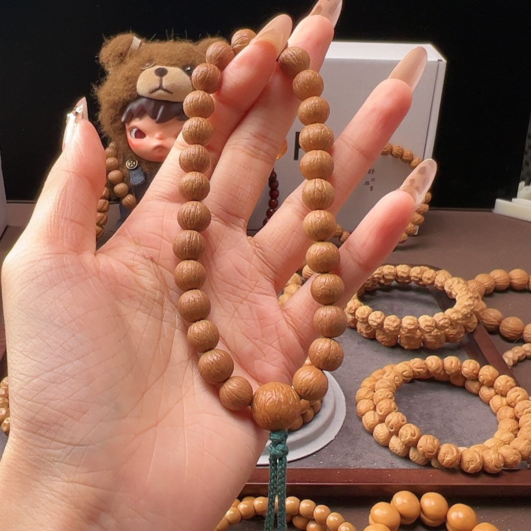 雲***渡手串猴头核桃10+凤羽手持全品无暇