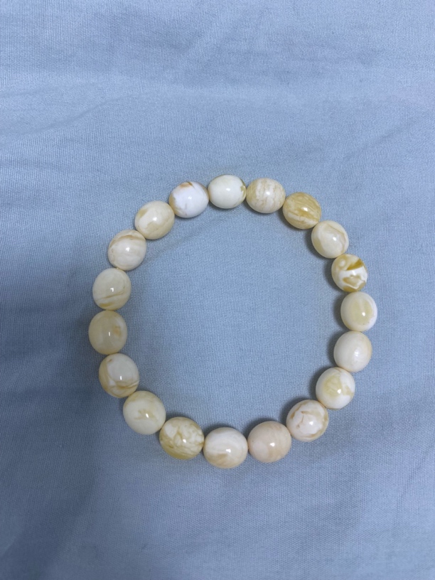 俄料瓷白花精工枣珠手串8+