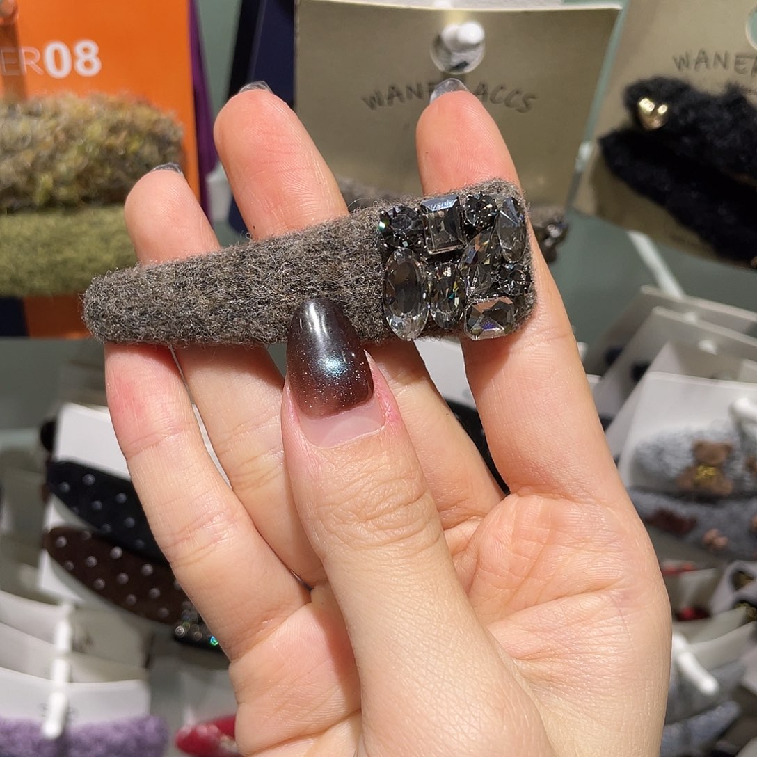羽毛非金属咖色爆米花一只