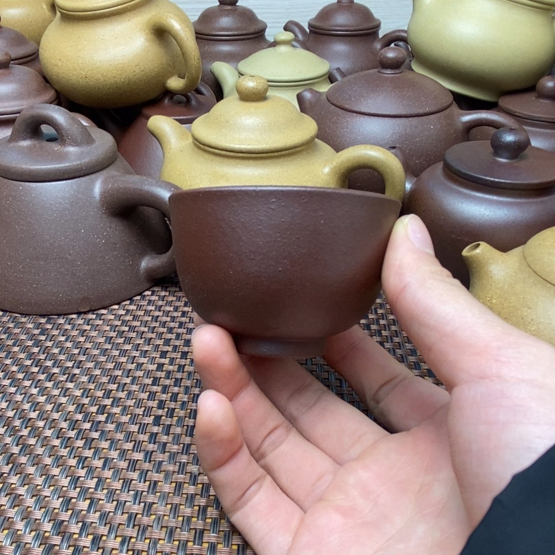 紫砂茶壶像****由石红主人杯
