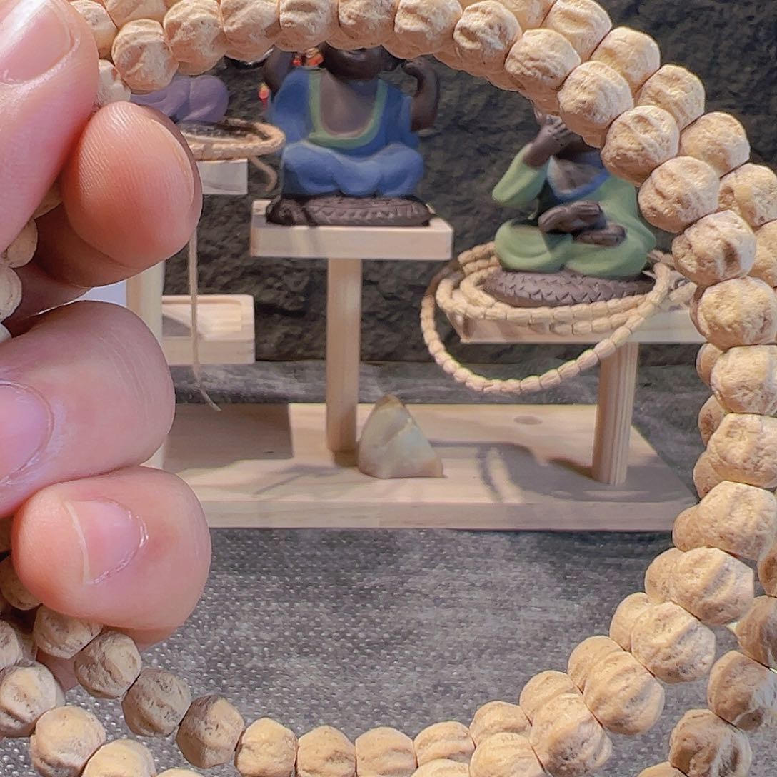 柏香籽/百香籽手串珲****馆