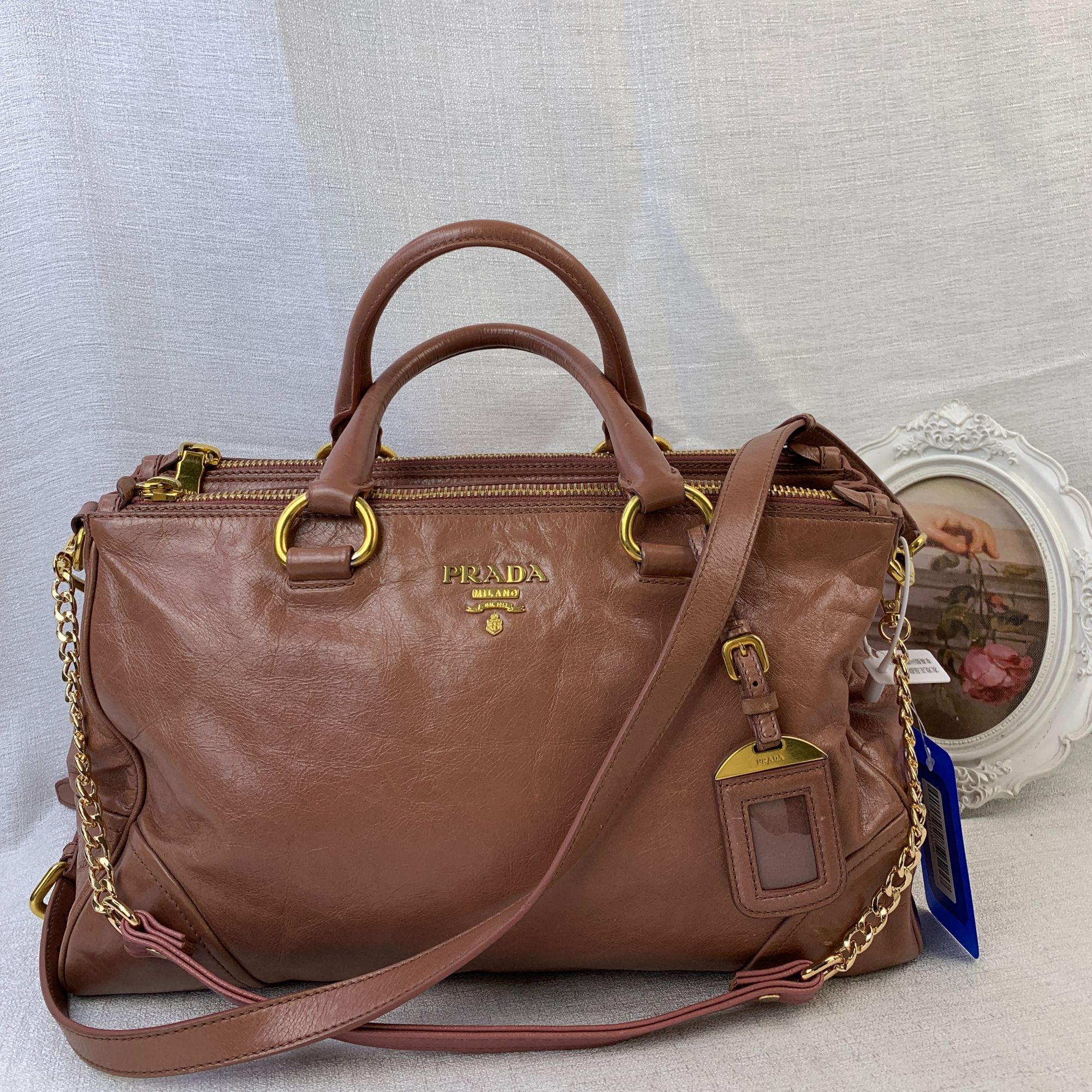 95新 Prada/普拉达 橡皮粉机车斜跨手提包/WJ10131374/1374
