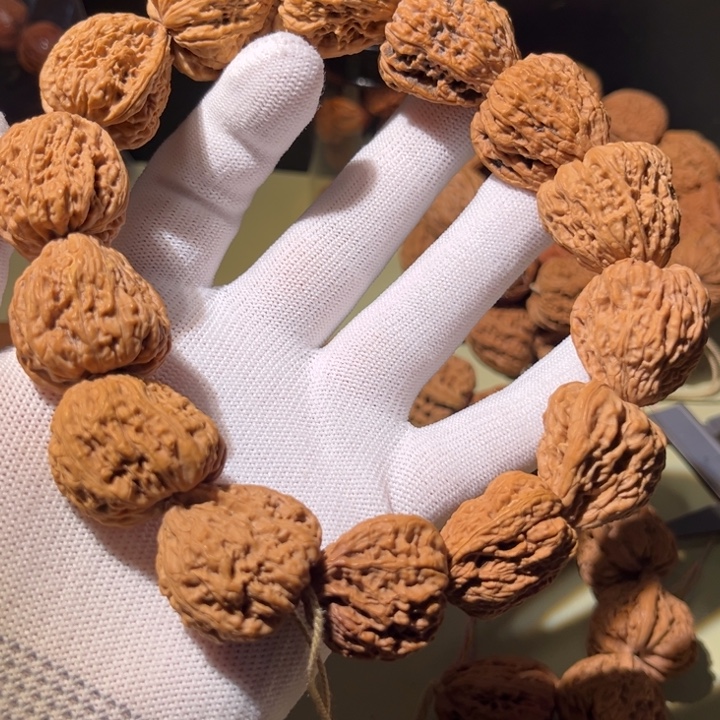 禹***电文玩核桃手串…………