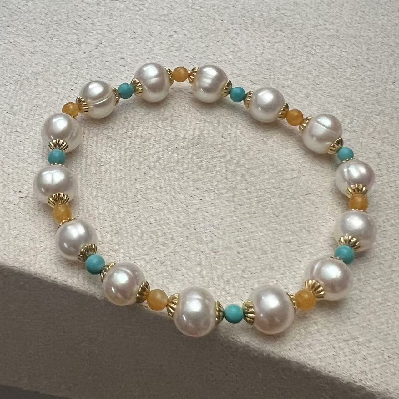 2025年圆巴洛克珍珠配东陵玉手串淡水无核珍珠通勤小众女生气质款