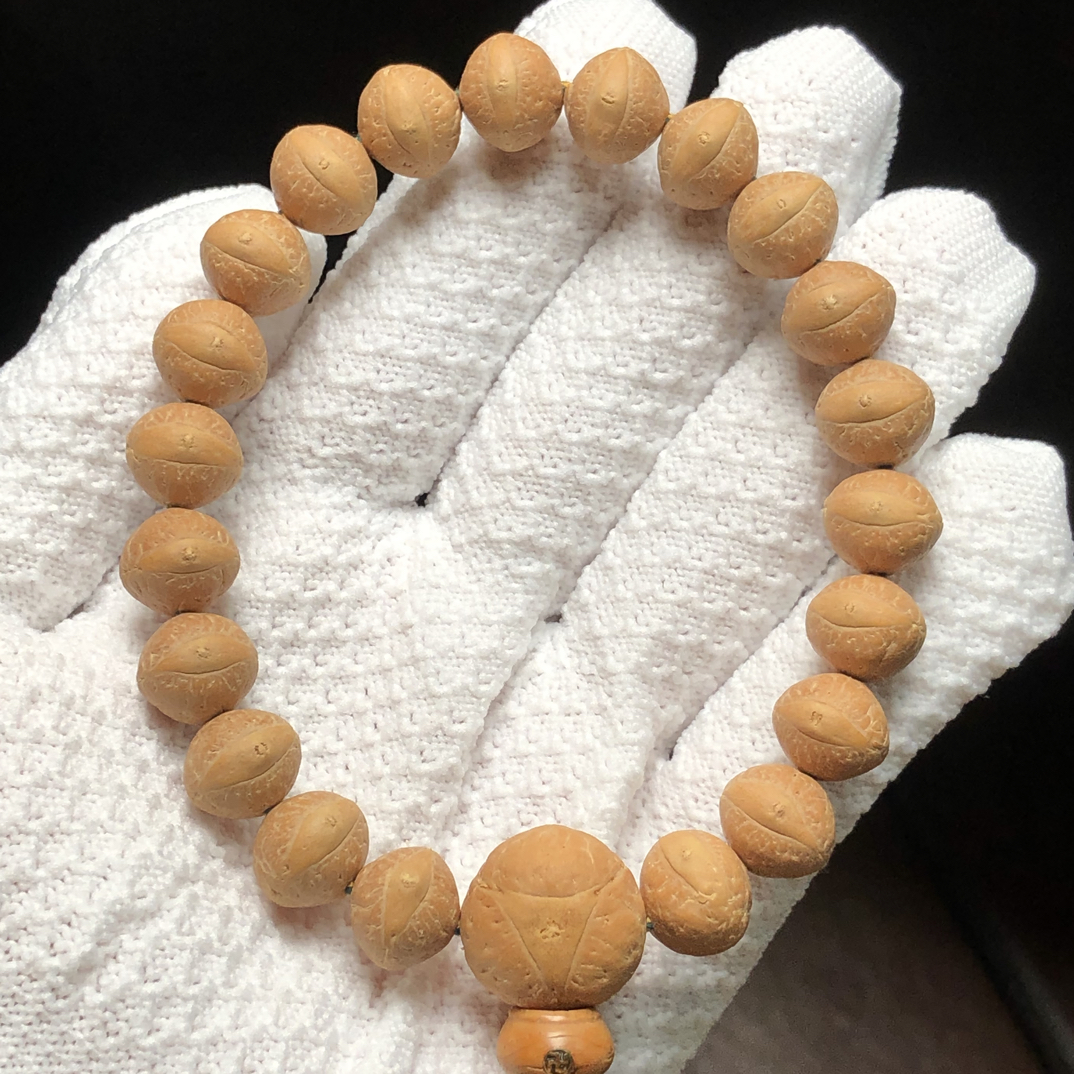 12.5mm矮桩飞碟单仓玉化皮尼泊尔凤眼手串密度高