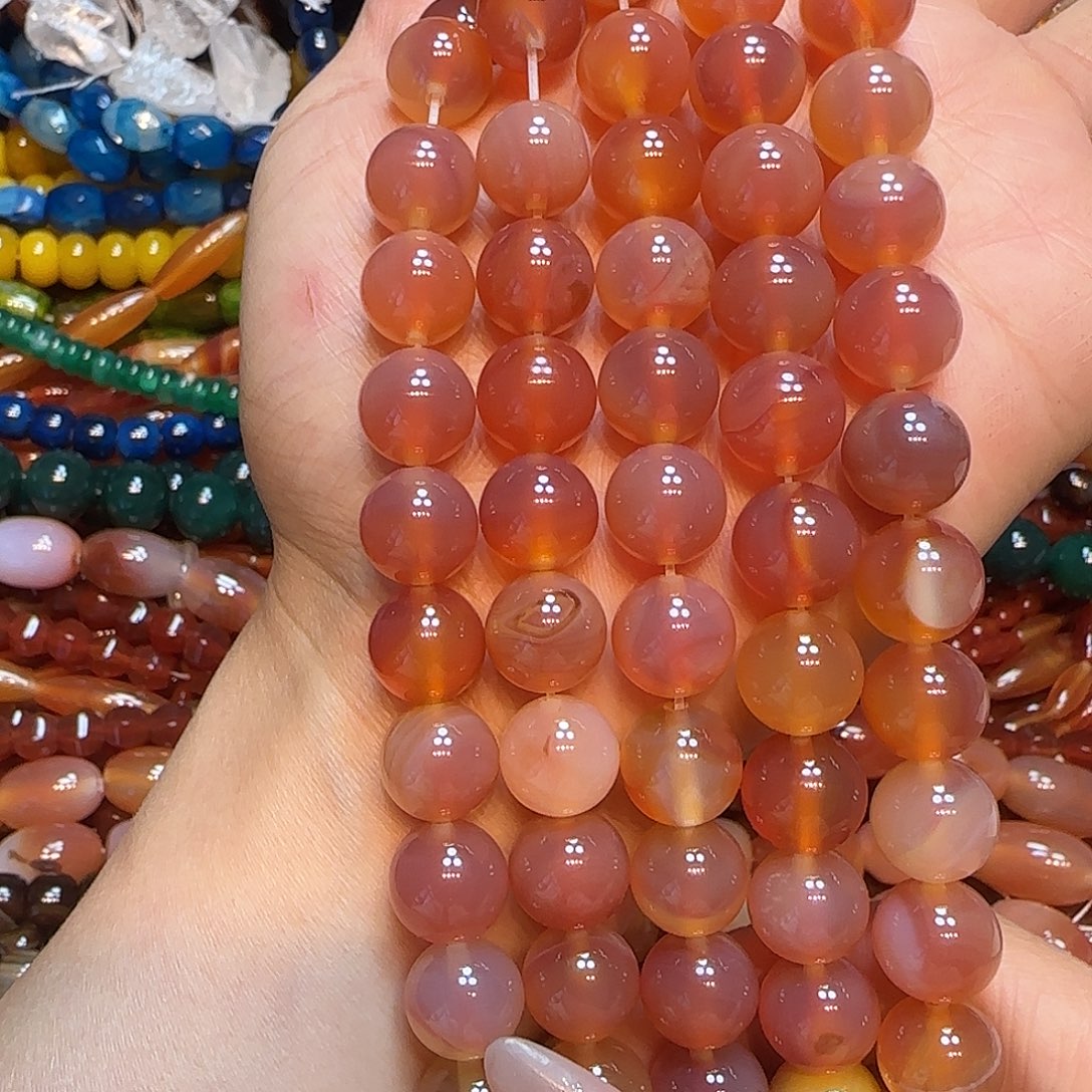 玛瑙/玉髓未镶嵌珠宝半成品粉盐源溏心一条12mm