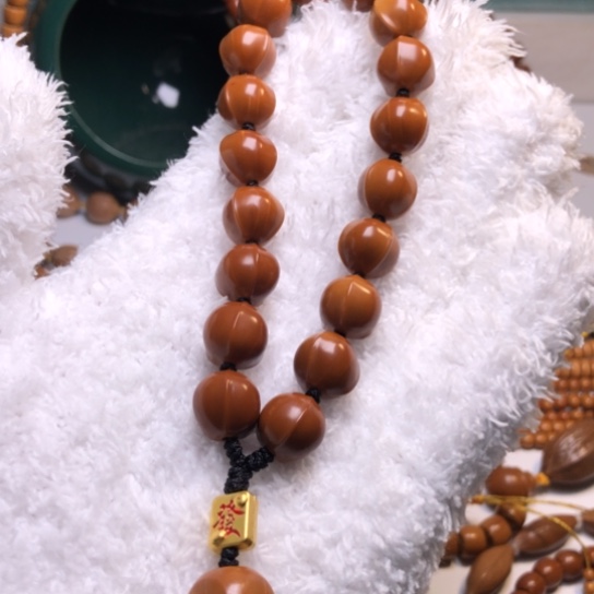 橄榄核吊坠1.25+鲨鱼背手持