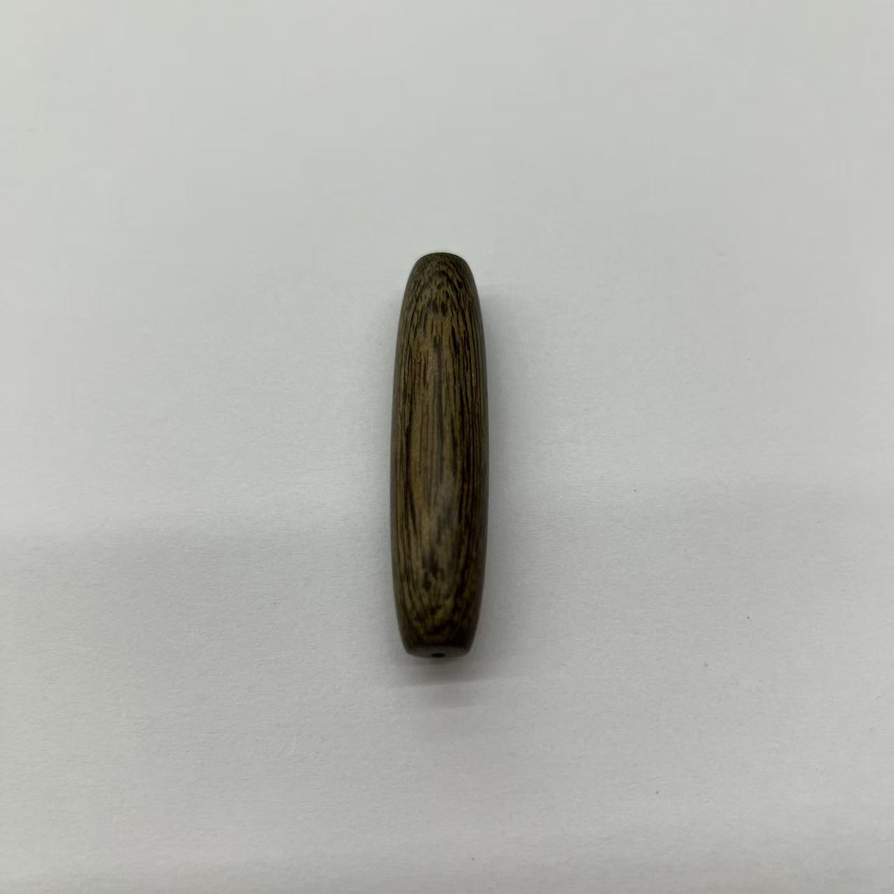 B8891 文莱树心油85分沉天珠 1.08x4.55cm 1.65g