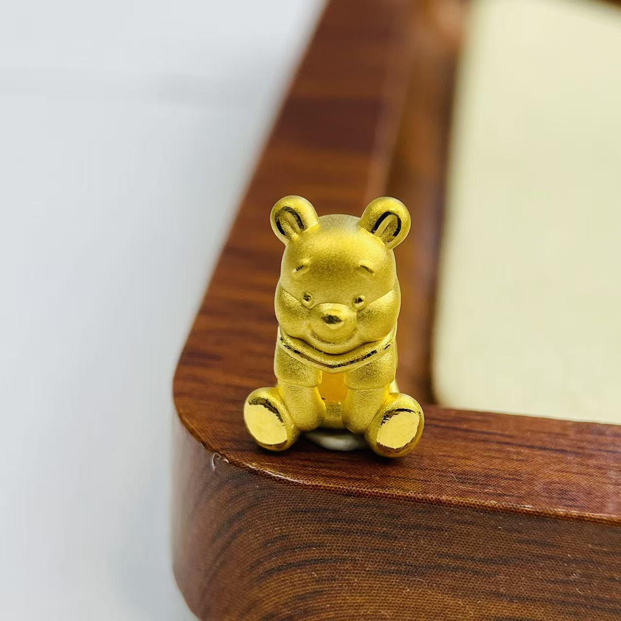 辉通黄金足金999维尼熊转运珠DP2715-01450