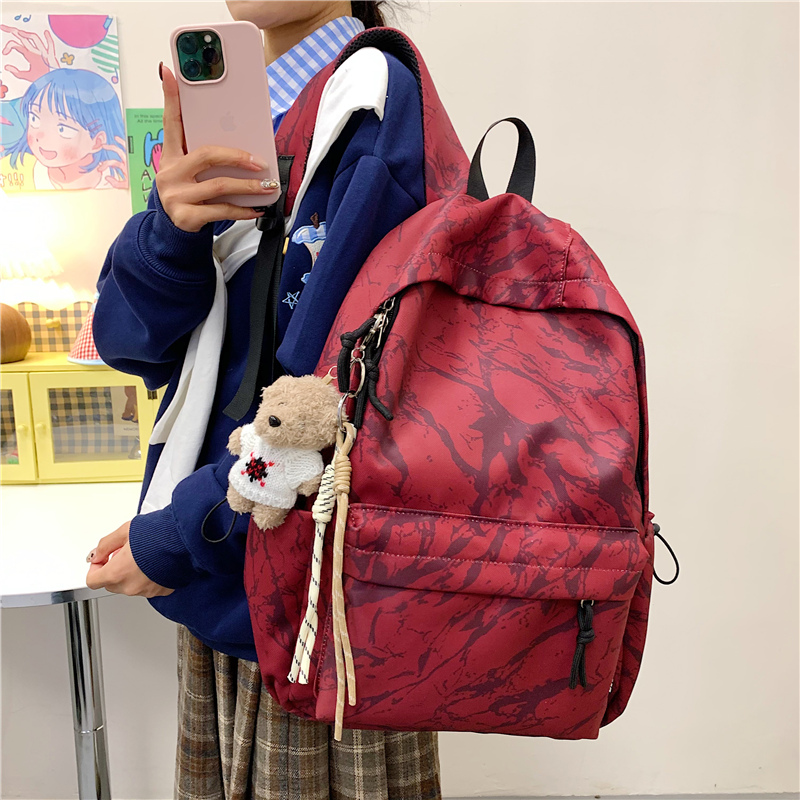 美式复古风防泼水大学生印花双肩包书包初中生轻便高中生韩版新款