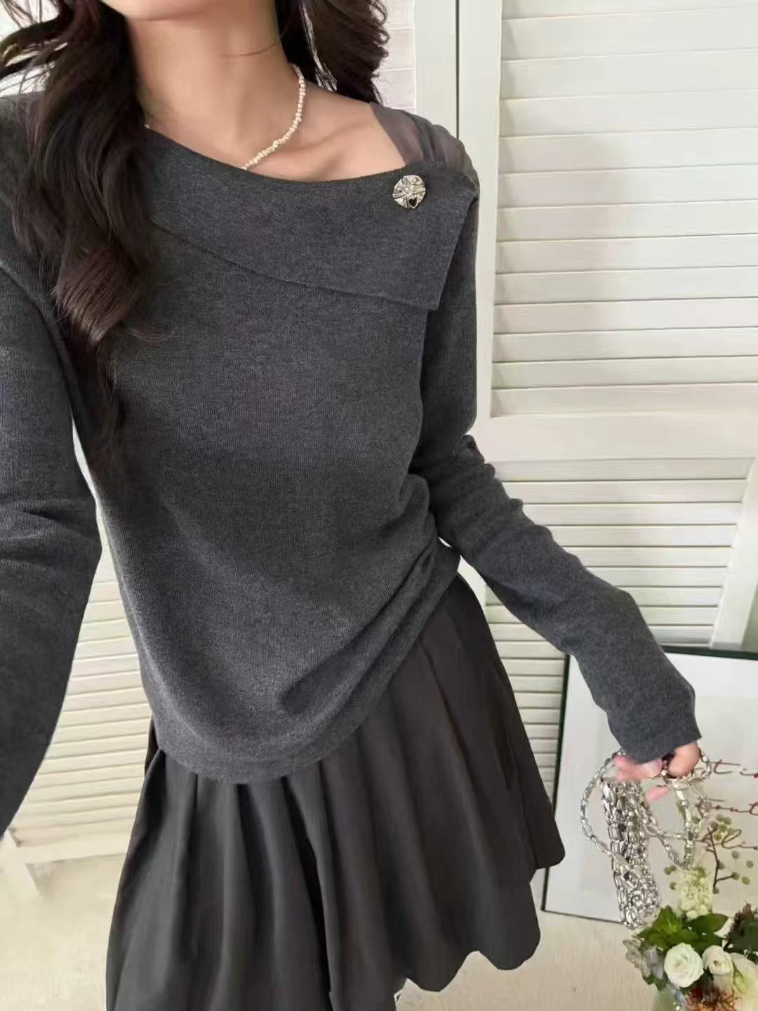 女装新款斜肩银扣时尚设计款毛针织衫