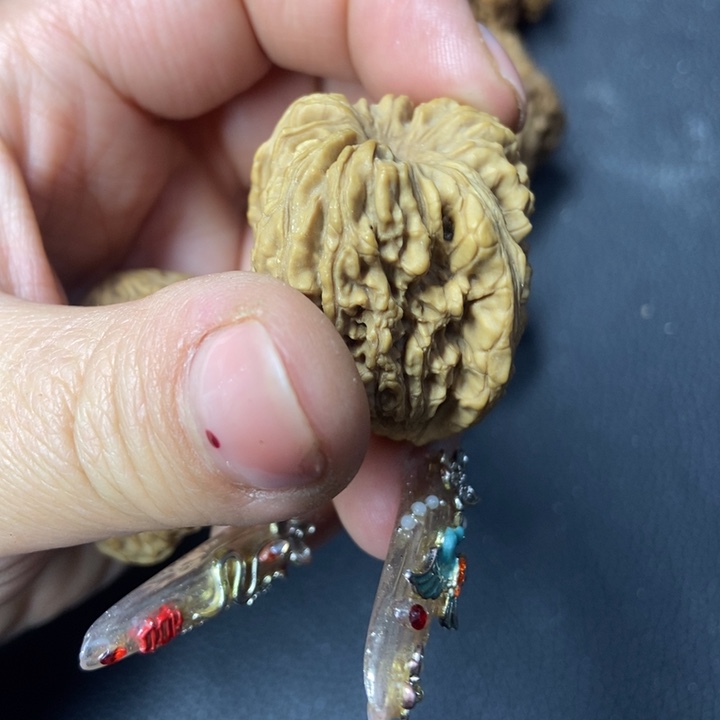 文玩核桃吊坠解****手可口可乐