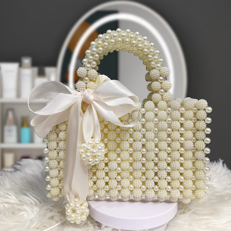 手工串珠杨梅包珍珠洋气夏季网红时尚小众编织单肩褶皱ins仙女