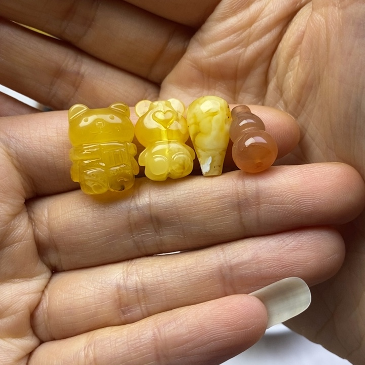 慵****蜜蜡未镶嵌裸石瑕疵