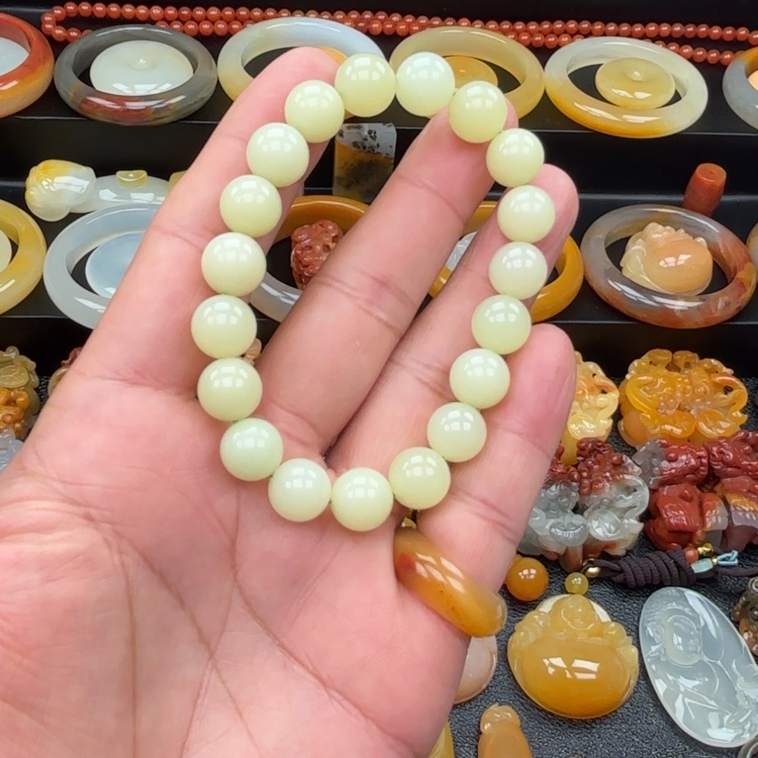 亦***木石英质玉（黄龙玉）合金手镯
