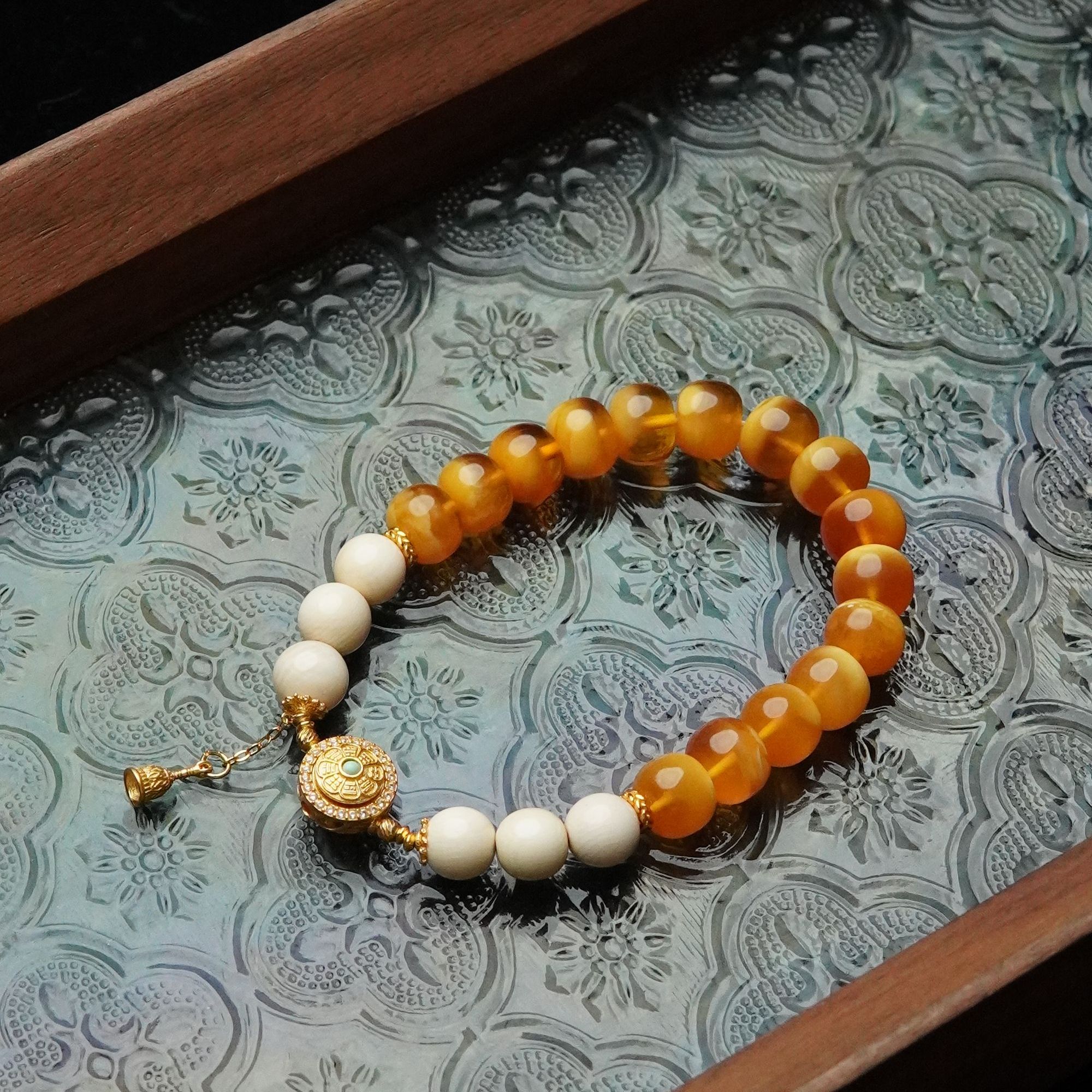 蜜雪必成 天然猛犸牙7mm圆珠单圈手串